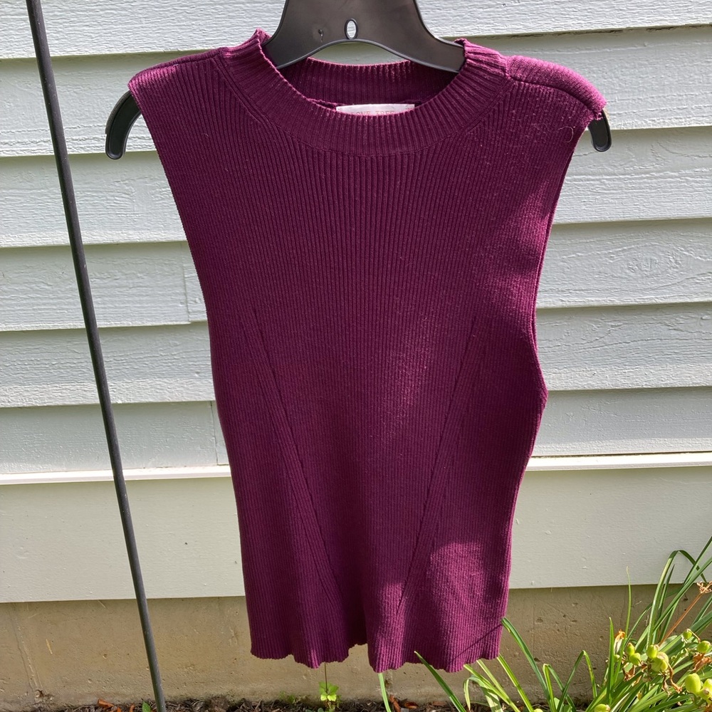 Love tree plum sleeveless knit top.  Size Large.